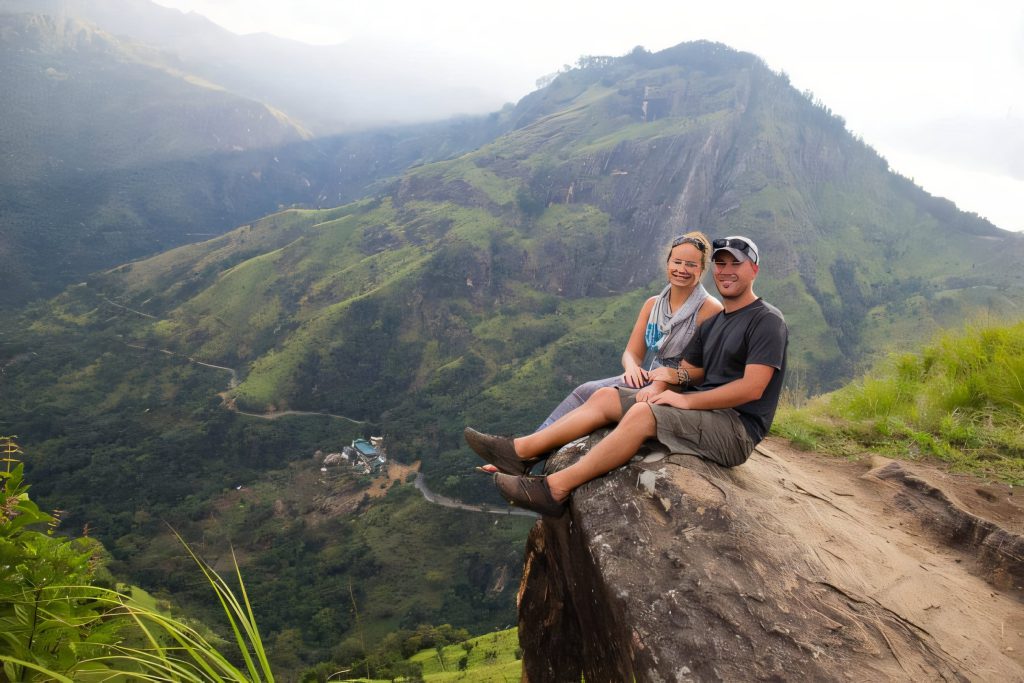 Couple resting on a peak near Ella