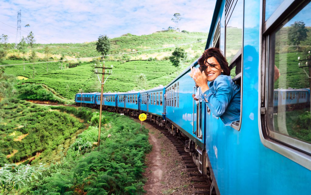 Leaning out of the Kandy–Ella train