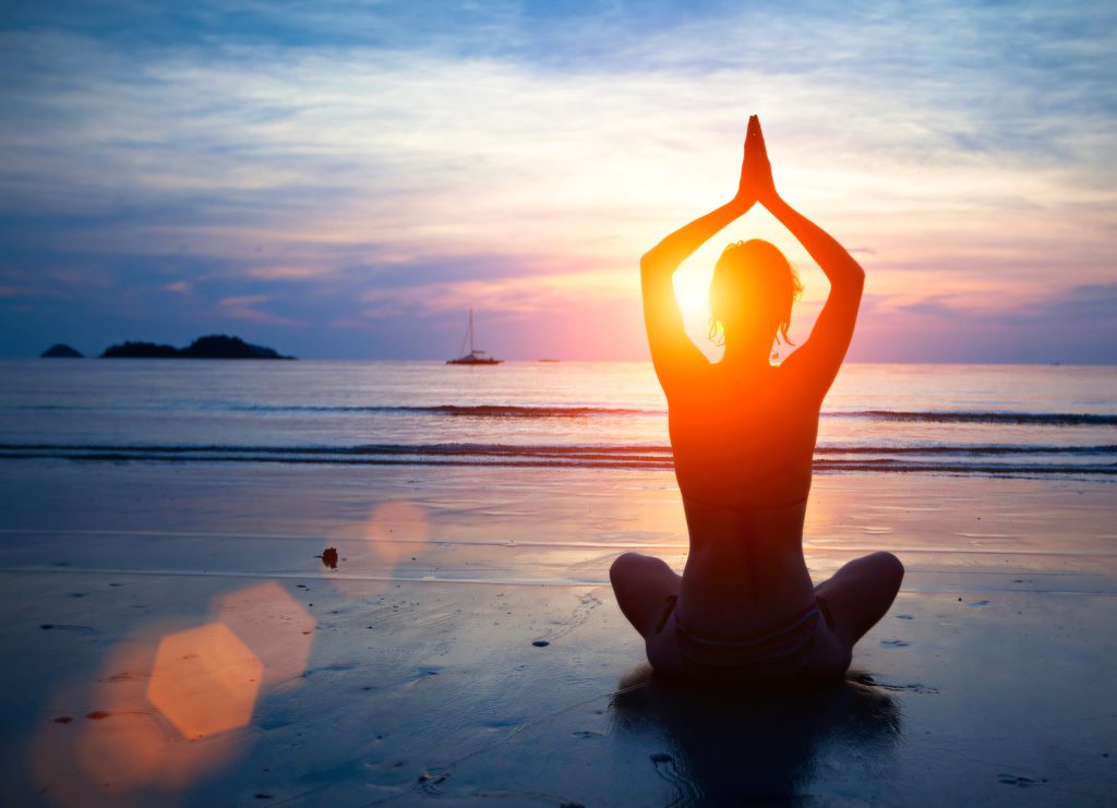 Sunset yoga on the beach